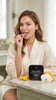 Woman placing a dissolvable MELT strip on her tongue