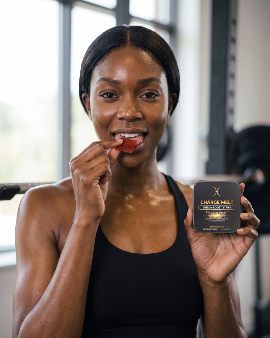 Woman placing a red CHARGE MELT oral strip on her tongue at the gym, tin in hand